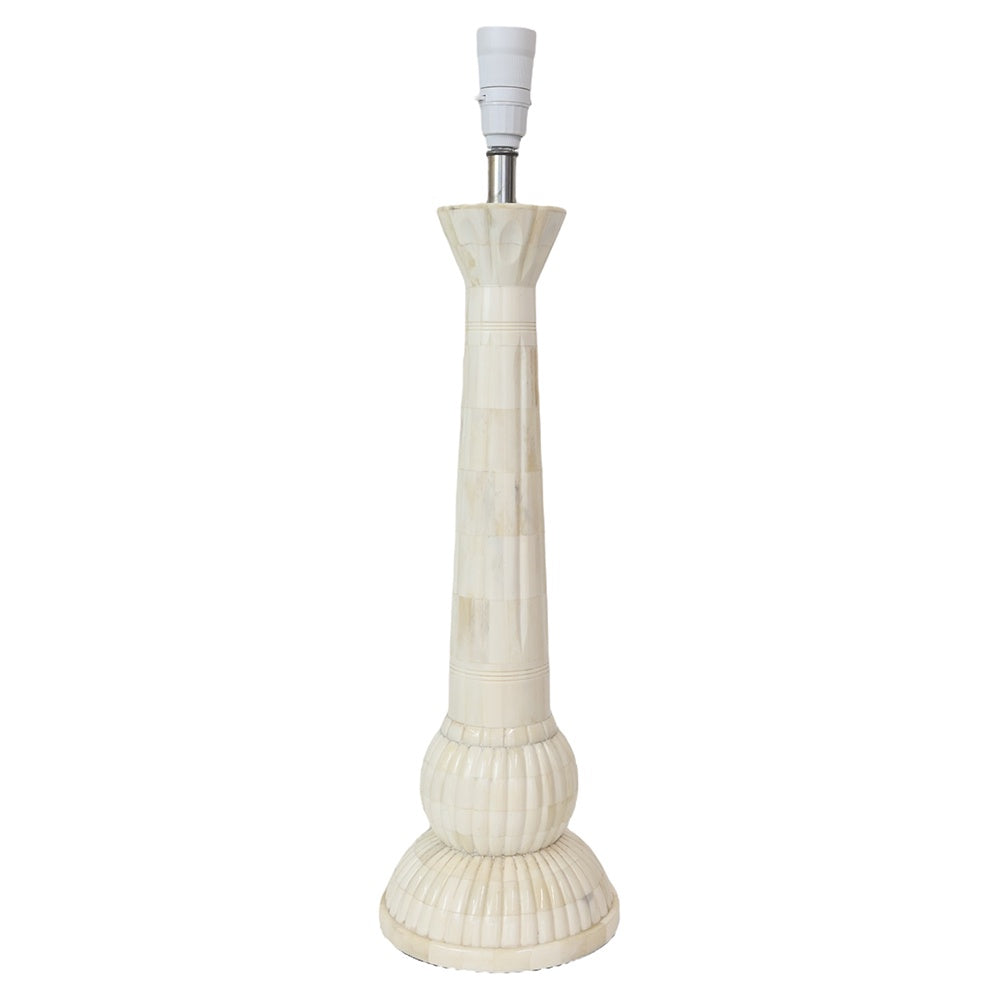 Decorative bone lamp with a ribbed design on a white background