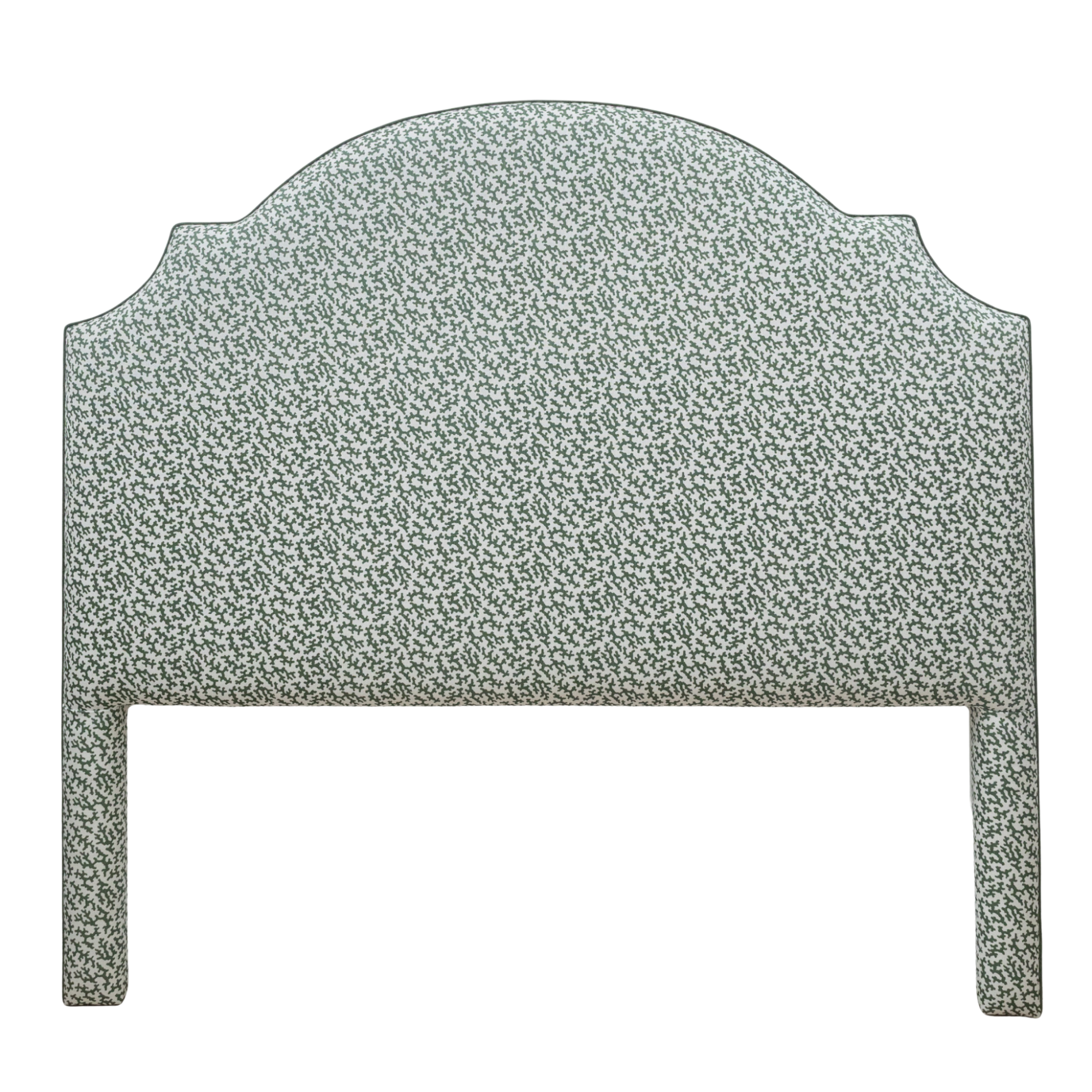 Green Seaweed print on white fabric upholstered bedhead on white background.